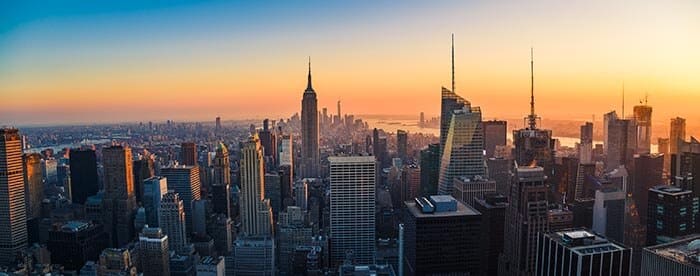 Skyline view of New York City as the sun sets.