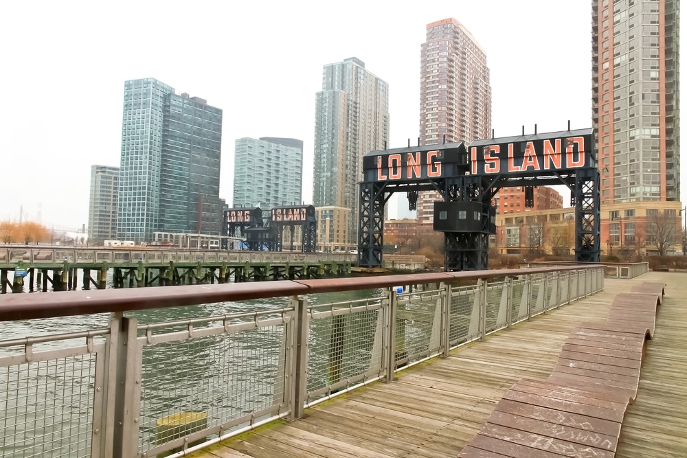 long island ny boardwalk with cityscape