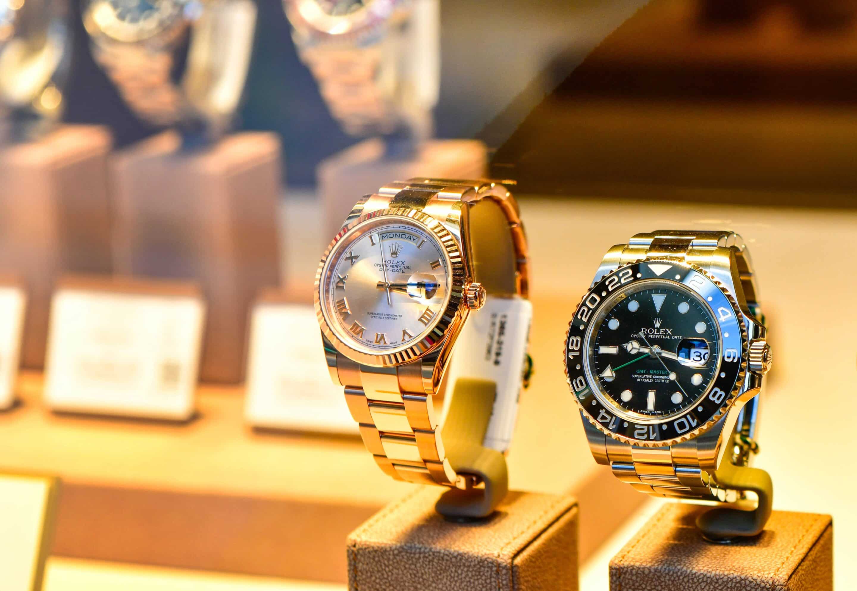 Close-up of two luxury watches on display, symbolizing the importance of coverage for high-value personal assets provided by the top high-value home insurance companies.